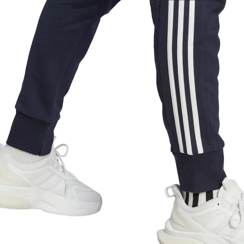 Adidas sports trousers in brushed cotton with Essentials Tapered Cuff band and cuff IC9406 legend ink