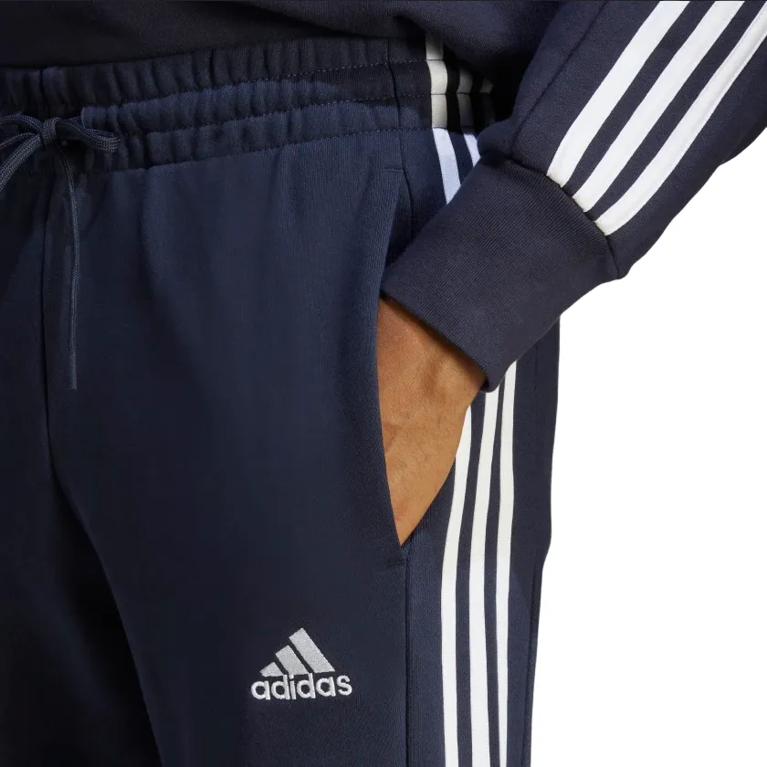 Adidas sports trousers in brushed cotton with Essentials Tapered Cuff band and cuff IC9406 legend ink