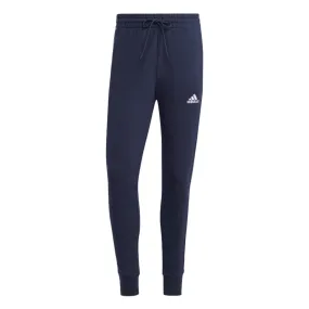 Adidas sports trousers in brushed cotton with Essentials Tapered Cuff band and cuff IC9406 legend ink